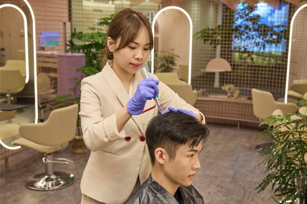 Precision scalp microneedling treatment at TrichoLab