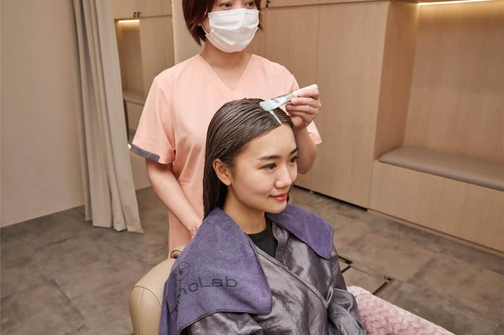 Hydrating Exfoliating scalp treatment being applied